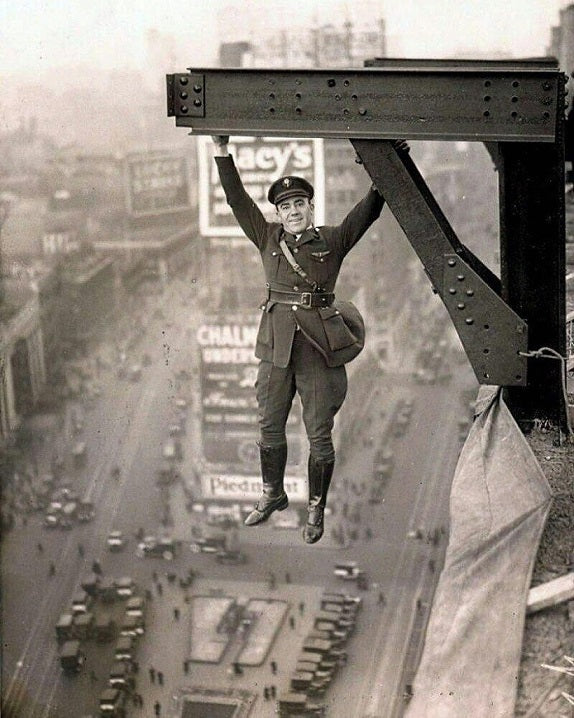 Police officer hanging over Times Square 1920 Print